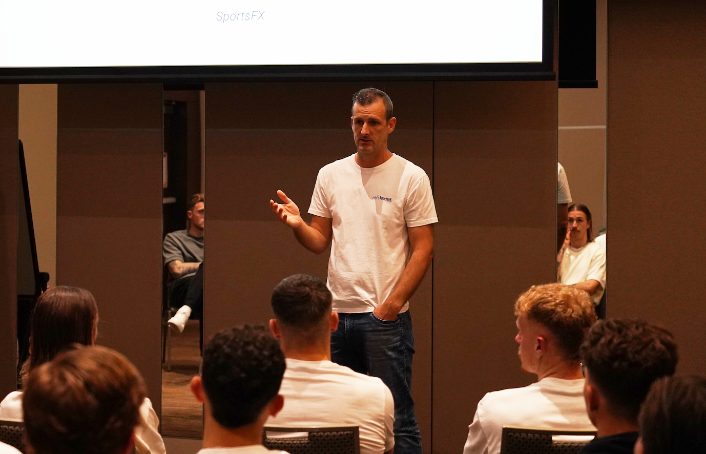 Chris Broadfoot presenting to professional athletes